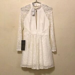 Bebe White long sleeve open back lace mini summer dress new w tags size medium